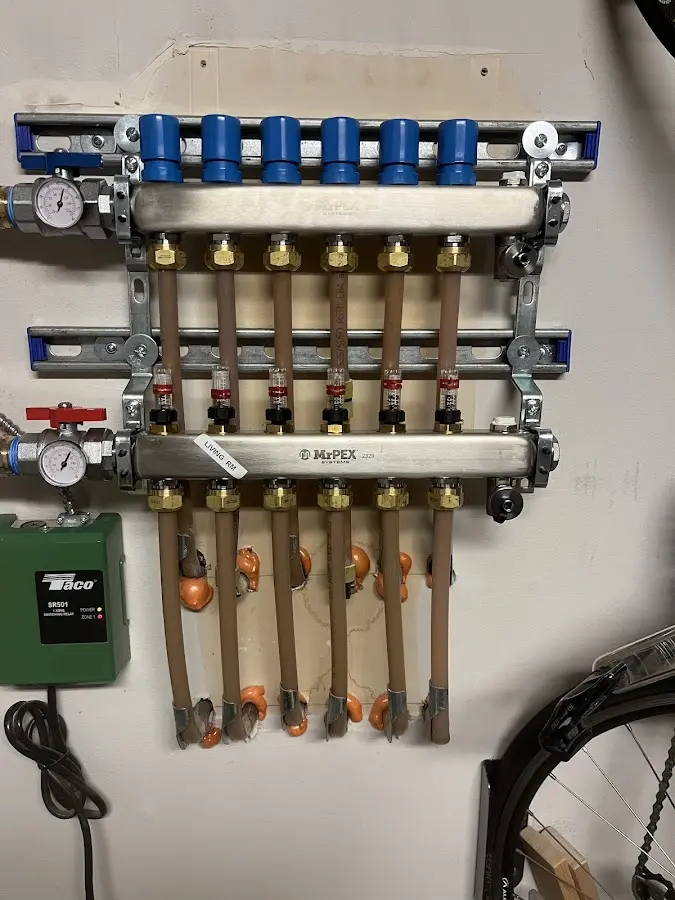 Plumber performing Gas Line Installation at a residential property in Spencer